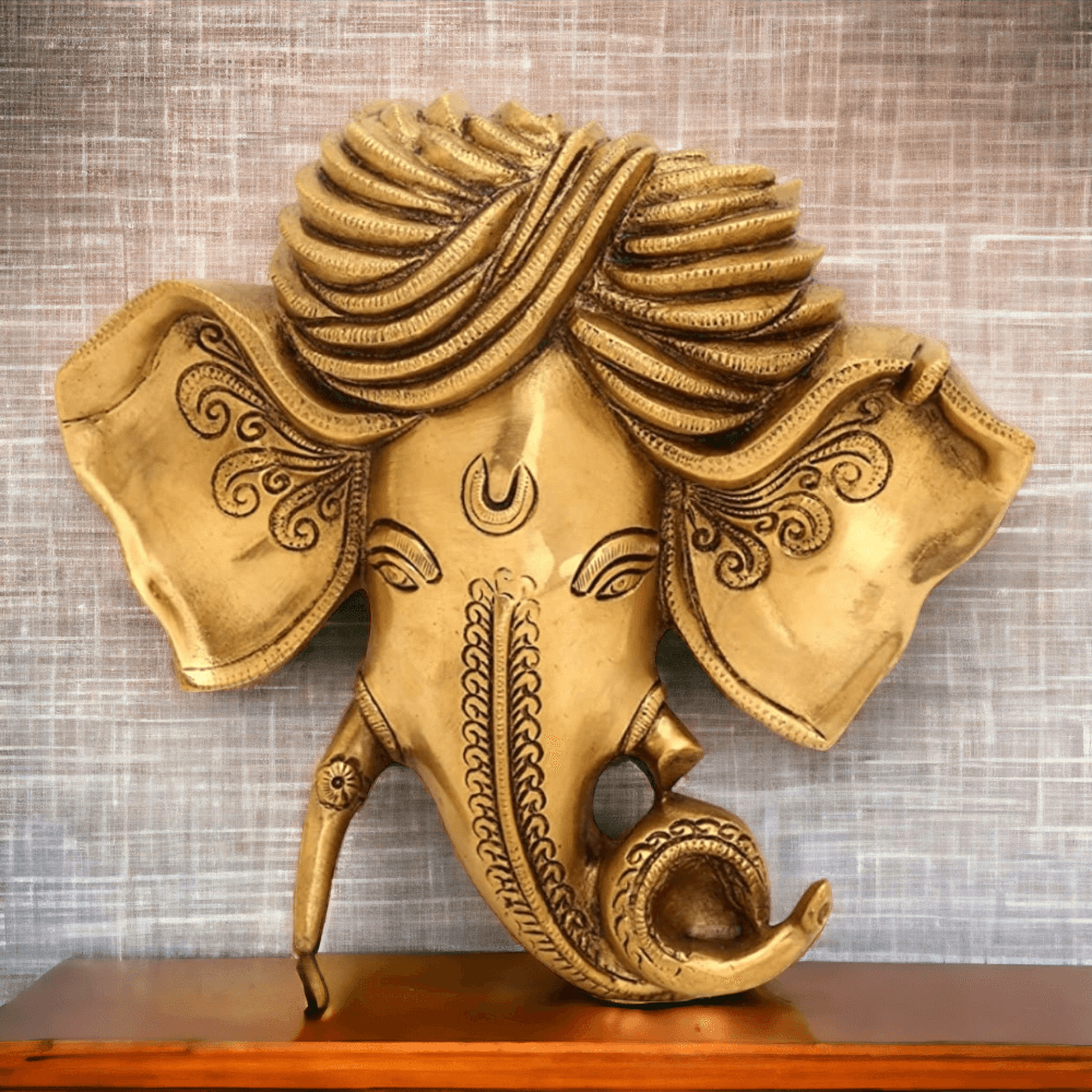 Handcrafted brass elephant idol showcasing rich details and ornate designs, perfect for luxury home decor.