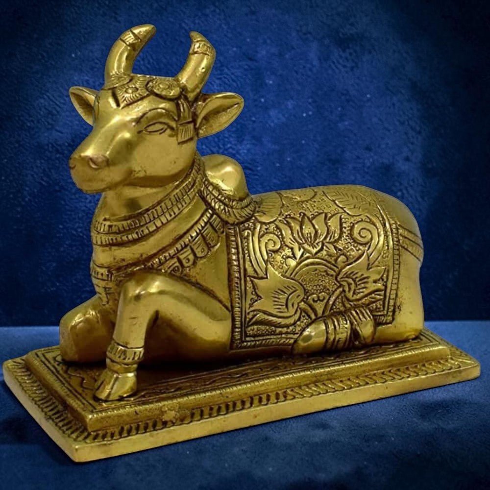 Close-up of Pure Brass Sitting Nandi Cow Statue with Fine Craftsmanship for Home Temple and Daily Worship