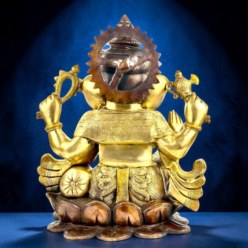 Angled View of 22 Inch Brass Lord Ganesha Statue on Lotus for Home Temple and Spiritual Decor