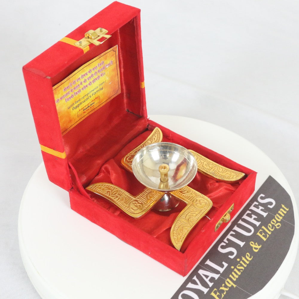 ROYALSTUFFS Akhand Brass Diya - Swastik Design with Red Velvet Box ( Length 4 Inch)