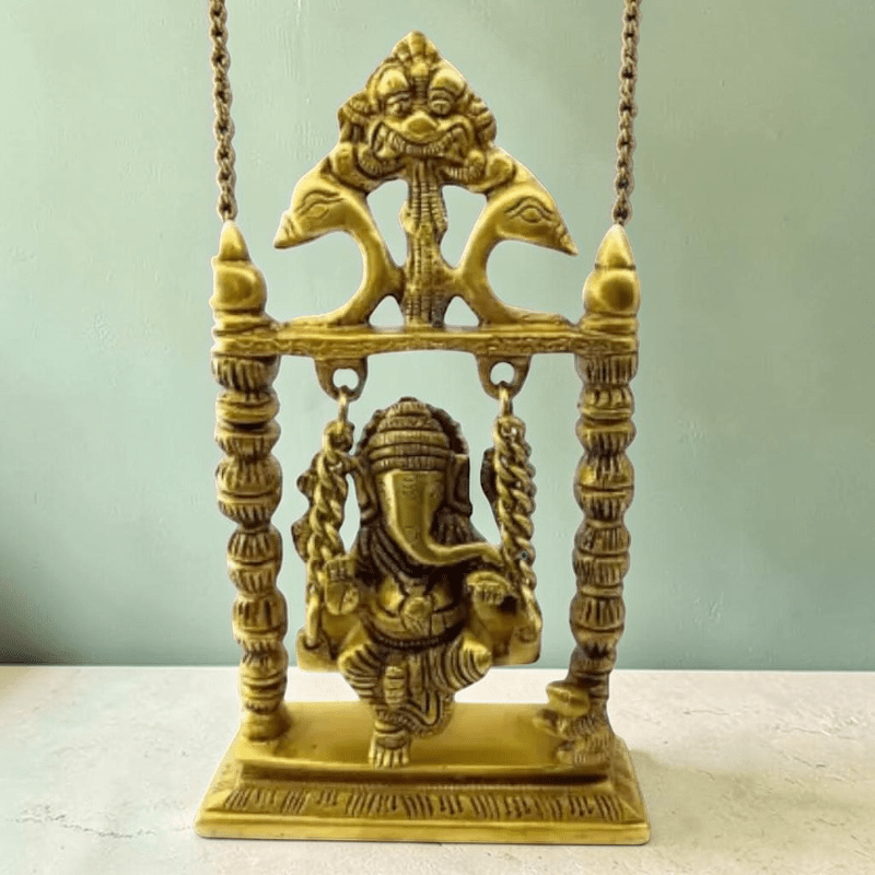 ROYALSTUFFS Ganesha on Swing Statue Idol Brass Height ( 8 Inch) - Royalstuffs.com