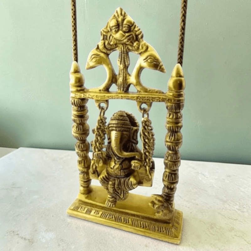 ROYALSTUFFS Ganesha on Swing Statue Idol Brass Height ( 8 Inch) - Royalstuffs.com