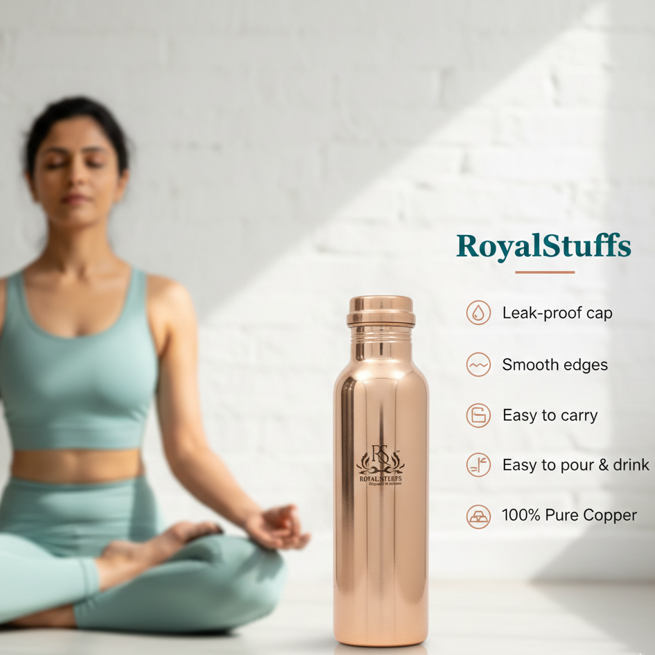 Rose gold copper water bottle with 'RoyalStuffs' branding next to a person meditating.