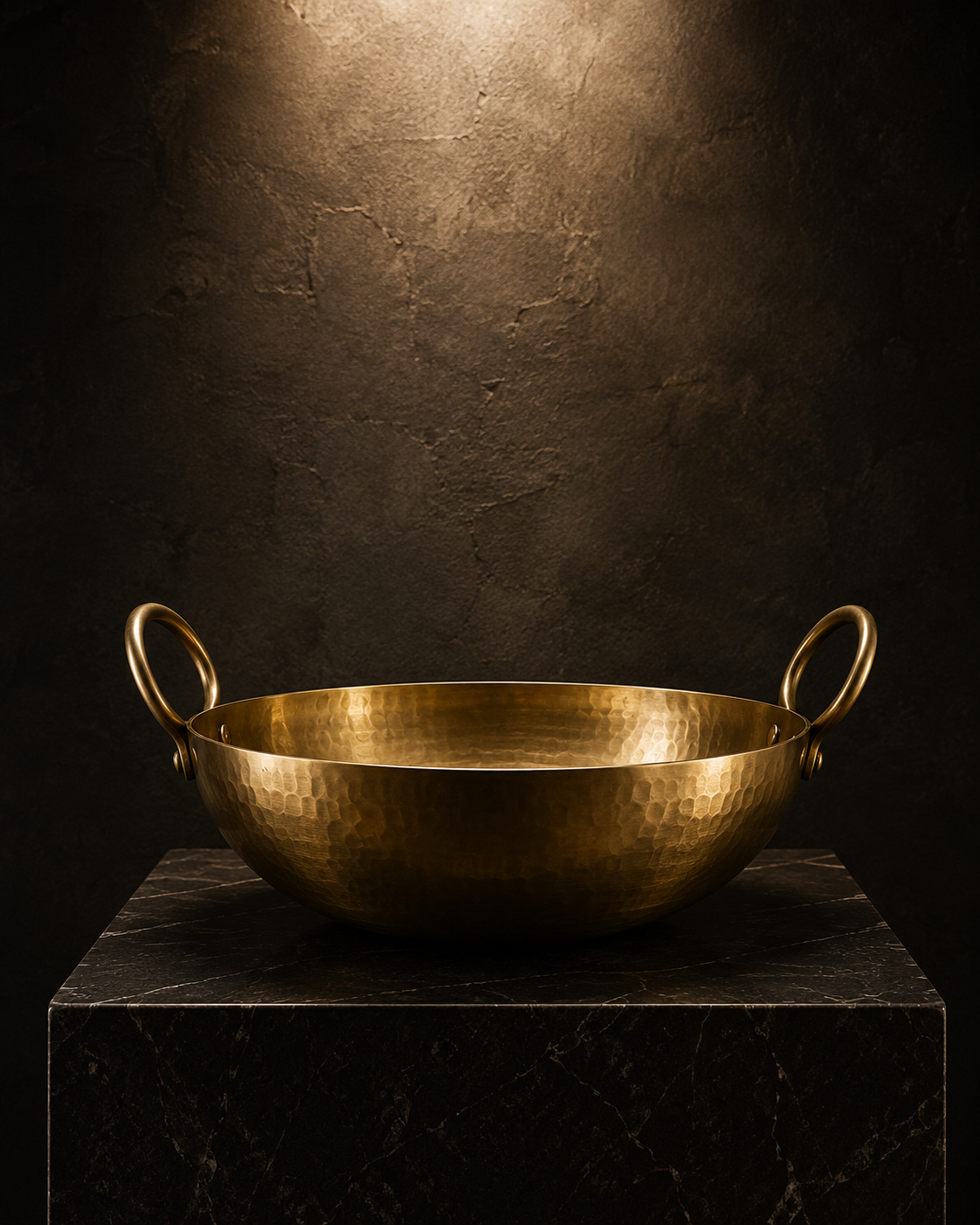 Artisan care and maintenance detail of hand-hammered brassware