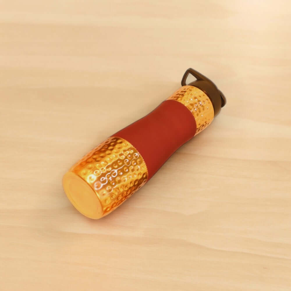 Designer Copper Hammered Sipper Bottle with Red Silicone Grip - 1 Liter - Royalstuffs.com