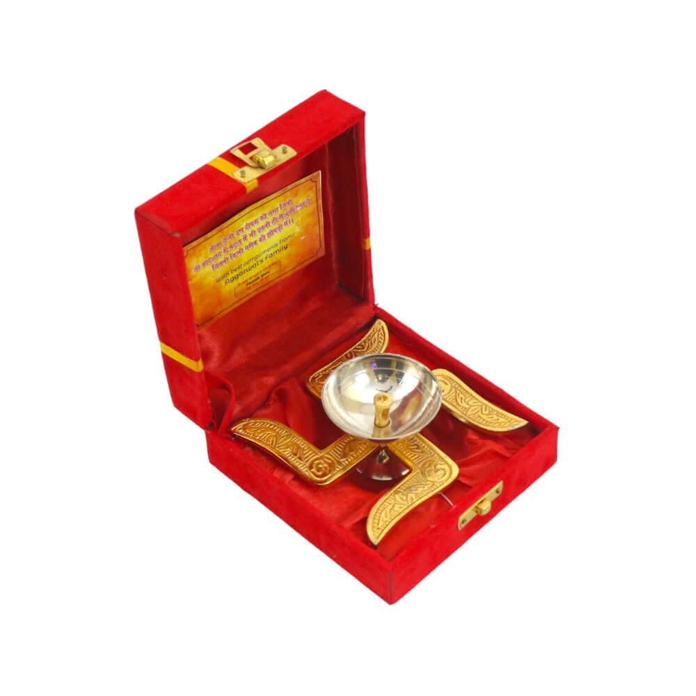 ROYALSTUFFS Akhand Brass Diya - Swastik Design with Red Velvet Box ( Length 4 Inch) - Royalstuffs.com