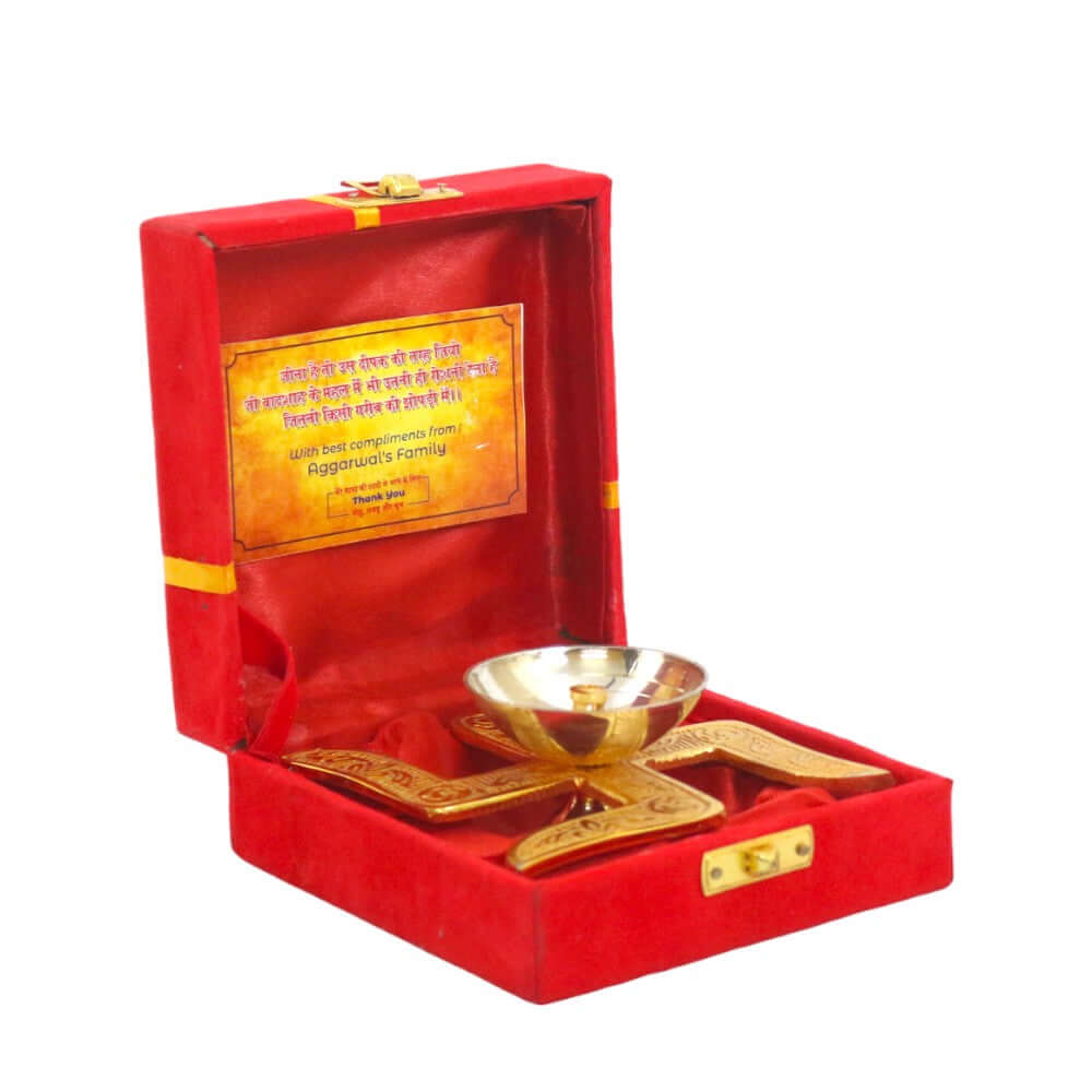 ROYALSTUFFS Akhand Brass Diya - Swastik Design with Red Velvet Box ( Length 4 Inch) - Royalstuffs.com